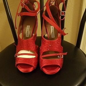 Upscale Tabitha Simmons red heels